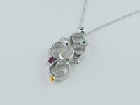 天然石のお任せペンダントネックレス 素材：Silver,K24,天然石 お客様からお預かりした天然石をイメージはお聞きした上で、 デザインはこちらにお任せで制作しました。 京都府のお客様